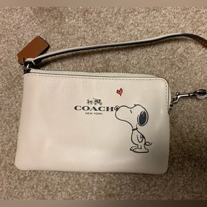 COACH x Peanuts Snoopy leather wristlet